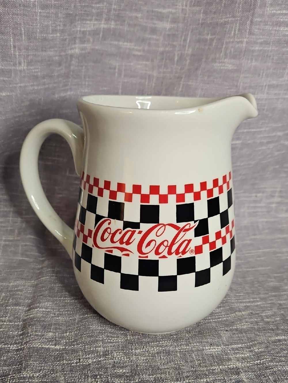 Coca-Cola White Ceramic Pitcher with Red Logo and Black Checkerboard